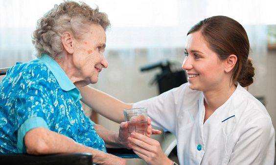 Old woman sitting in a wheelchair